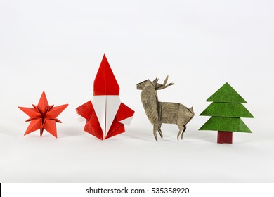 Christmas Set. Santa Claus, Red Star, Deer And Christmas Tree Origami, Paper Craft