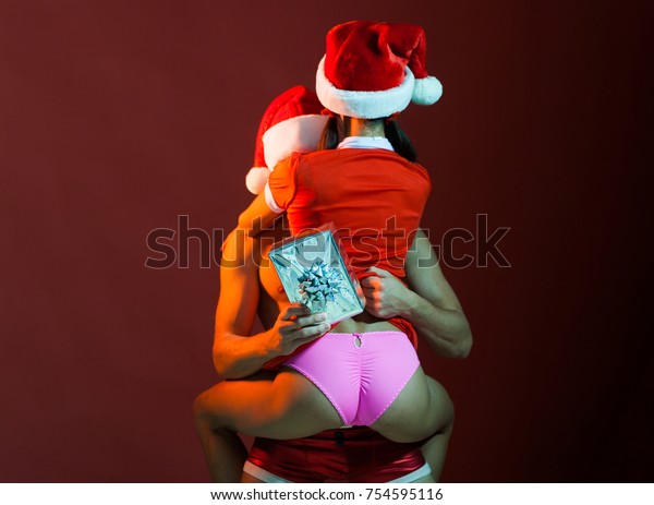 CAL: Releases Christmas-sexy-couple-santa-hats-600w-754595116