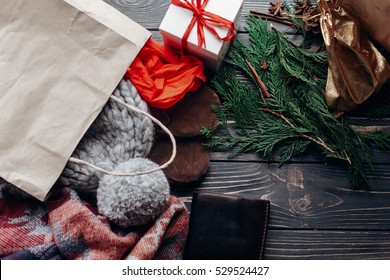 christmas shopping concept. big sale. seasonal rustic background with money credit cards wallet and bag with presents. advertising with space for text  - Powered by Shutterstock