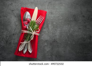 Christmas Silverware At Dark Slate Table. Top View, Copy Space.