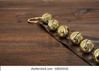 Christmas Sleigh Bells On Wood