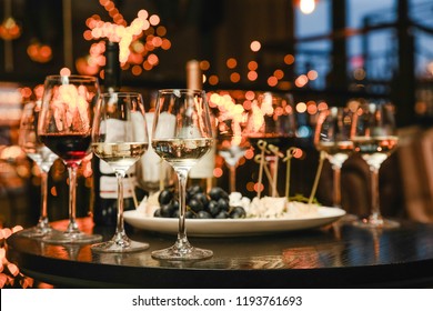 Christmas Snacks On The Table, Cheese And Glasses Of Wine