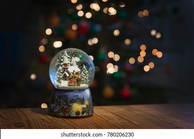 Christmas Snowglobe On Bokeh Background