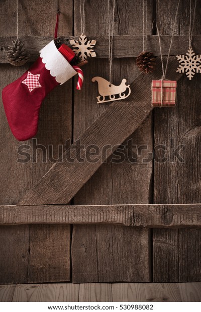 Christmas Sock Gifts On Wooden Door Stock Photo Edit Now 530988082