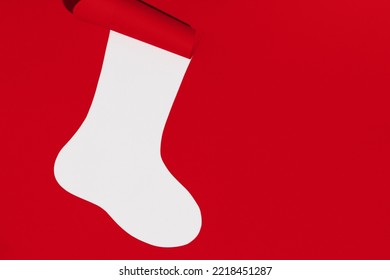 Christmas sock on white and red background. Space for text. Mockup. High quality photo - Powered by Shutterstock