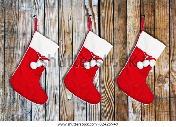 Christmas Socks Hung On Wooden Wall Stock Photo (Edit Now) 82425949