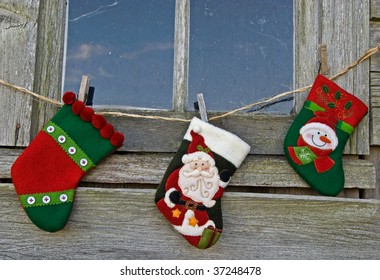 Christmas Socks Outside Old Window