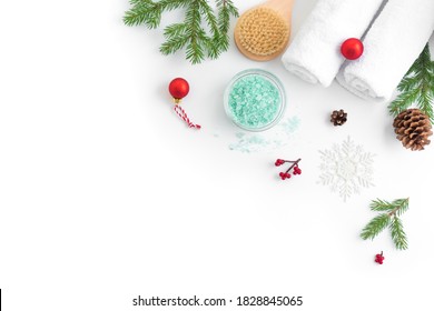 Christmas Spa Concept And Winter Skin Care Products, Fir Branches And Snowflakes On White Background, Flat Lay, Copy Space.  Seasonal Beauty Routine And Body Care Concept.