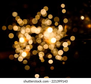 Christmas sparkler firework flame on black