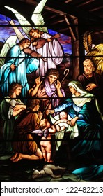 Christmas Stained Glass Window Depicting Birth Of Jesus Christ