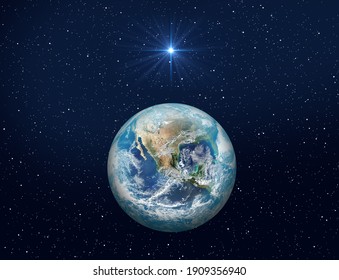 Christmas Star of Bethlehem Nativity, christmas of Jesus Christ. Planet Earth on dark blue night sky with bright star. Elements of this image furnished by NASA 