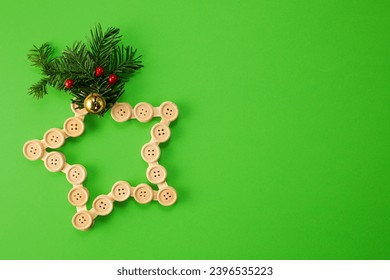 A Christmas star made of buttons. Top view. Copy space - Shutterstock ID 2396535223