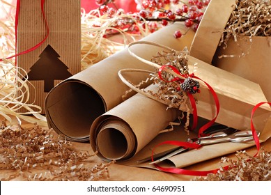 Christmas Still Life With Eco Friendly Brown Wrapping Paper And Gift Packaging. Close-up With Shallow Dof.