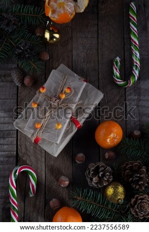 Similar – Foto Bild Weihnachtskugeln in Box auf rustikalem Holzgrund