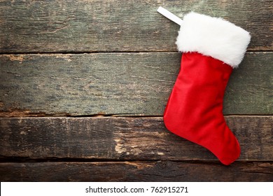 Christmas Stocking On Wooden Table