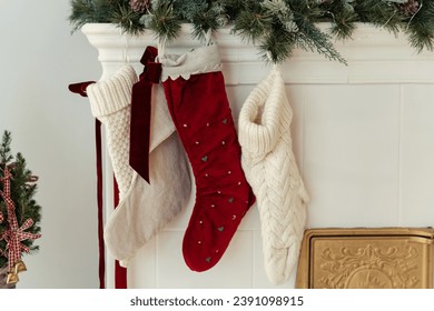 Christmas stockings hanging by fireplace at home - Powered by Shutterstock