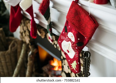 Christmas Stockings Hanging On A Chimney