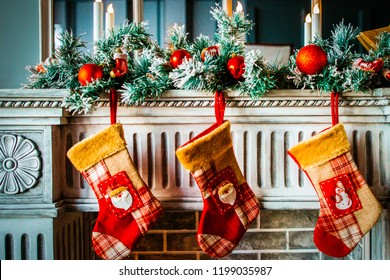 Christmas Stockings Hanging On The Fireplace