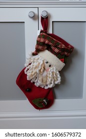 Christmas Stockings Hung On Cupboard Handle