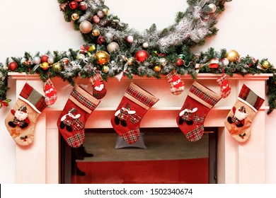 Christmas Stockings On A Fireplace Mantel.