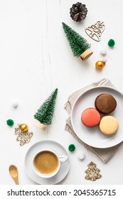 Christmas Table With Macarons On A Plate And A Cup Of Coffee. Dessert, Top View, Vertical. 