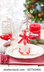 Christmas Table Place Setting. Elegant Empty Plate, Cutlery, Napkin And Blank Name Card On Candy Cane Stand.