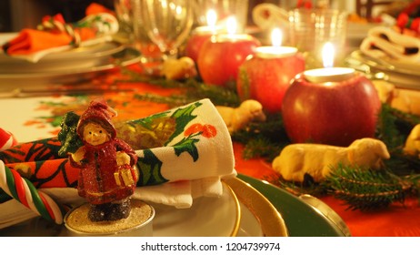 Christmas Table Set With Decorated Napkin And Statuette