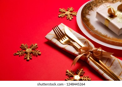 Christmas Table Setting Conceptual Design With Fork, Knife And Festive Attributes. New Year Banquet Serving Appointment Options With Silverware. Background, Close Up, Top View, Flat Lay, Copy Space.