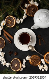 Christmas Tea Party With Christmas Tree, Dried Oranges And Popcorn Garland