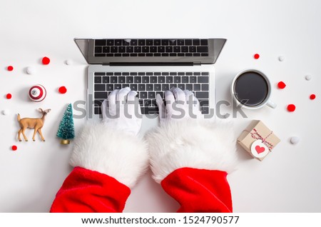 Christmas theme with laptop computer and xmas ornaments from above