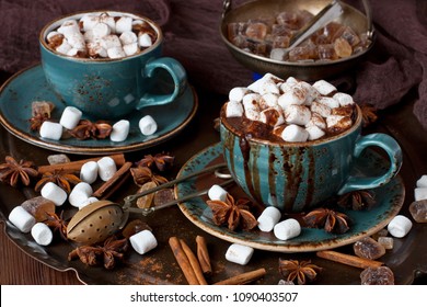 Christmas time composition. Cup of creamy hot chocolate with melted marshmallows 