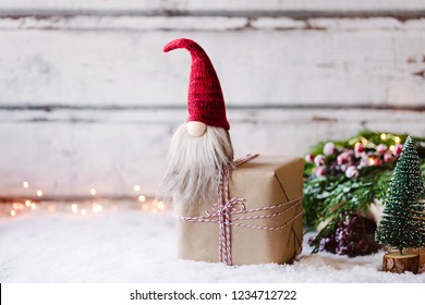 Christmas time is near - Cute little winter gnome is waiting for christmas - Shutterstock ID 1234712722