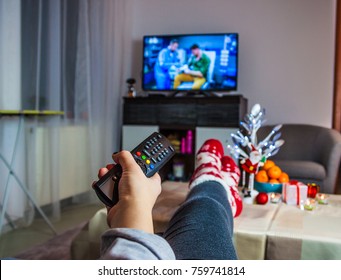 Christmas Time. Woman Watching Tv 