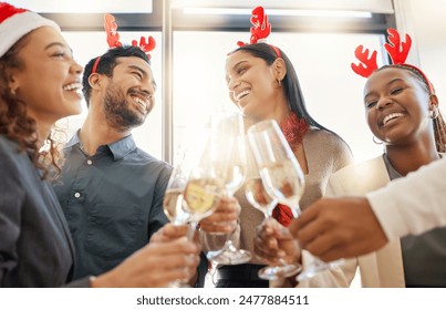 Christmas, toast and friends with drink in office for party celebration, social gathering and company lunch. Happy team, diversity and group of people with champagne for festival, cheers or holiday - Powered by Shutterstock