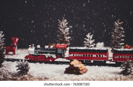Christmas toy train with decoration, smow and lighting