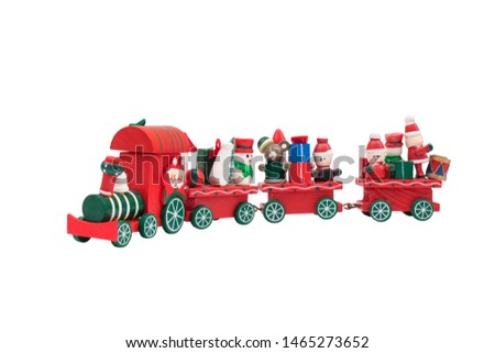 Christmas Train toy model carry snowman and gifts isolated on white background.