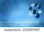 Christmas tree bauble and hanging snowflake on glitter blue background with bokeh light. Festive winter holiday decoration and ornament. Modern design with copy space for card, banner, invitation