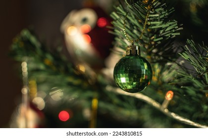 Christmas tree with bright toys on New Year holidays