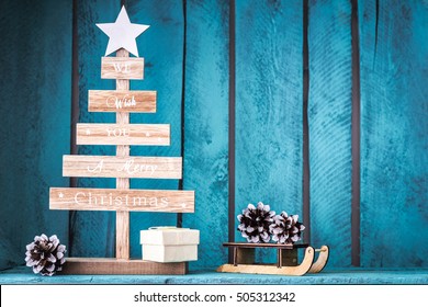 Christmas tree decoration on wooden blue background. DIY. - Powered by Shutterstock