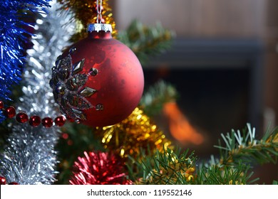 Christmas tree decorations in  interior with  fireplace