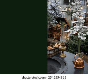 christmas tree and decorations on the table. Antique copper teapot outside on a winter terrace. antique tea kettle. place for text - Powered by Shutterstock