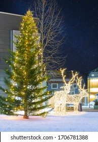 Christmas Tree And Christmas Deer Decorations In Tromso, Norway
