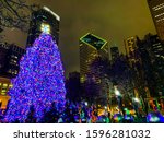 Christmas tree during holidays at night in Millennium Park.