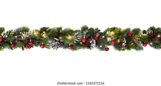 Christmas Tree Garland Decorated With Red Baubbles And Yellow Lights, Isolated On White, Festive Background Banner