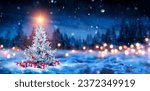 Christmas Tree And Gift Boxes On Snow In Night With Shiny Star and Forest - Winter Abstract Landscape