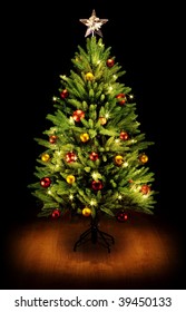 Christmas Tree And Gifts. Over Black Background