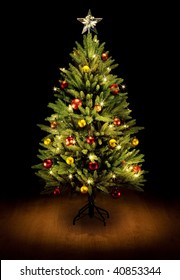 Christmas Tree And Gifts. Over Black Background