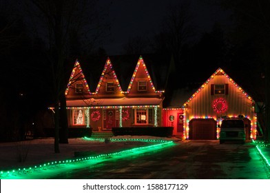 Christmas Tree Light Holiday Decoration: Illuminated Windows, House And Christmas Trees In Night. Bowmanville, Ontario, Canada