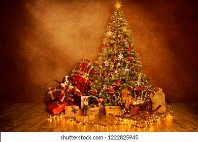 Christmas Tree Lights In Decorated Xmas Room Interior, Lighting Garland Presents Gifts On Wood Floor