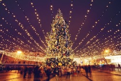 Christmas Tree And Lights At Night In Kyiv. People In Blurred Motion